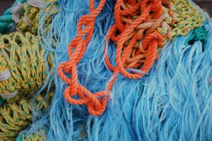 colourful pile of fishing nets and ropes